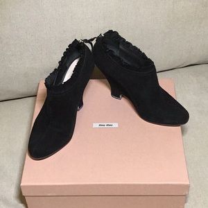 Black suede wedge bootie